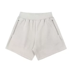 Ribbed-waistband athletic shorts with side pockets and a zipper