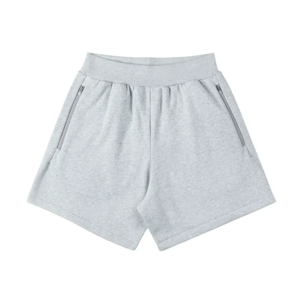 Ribbed-waistband athletic shorts with side pockets and a zipper